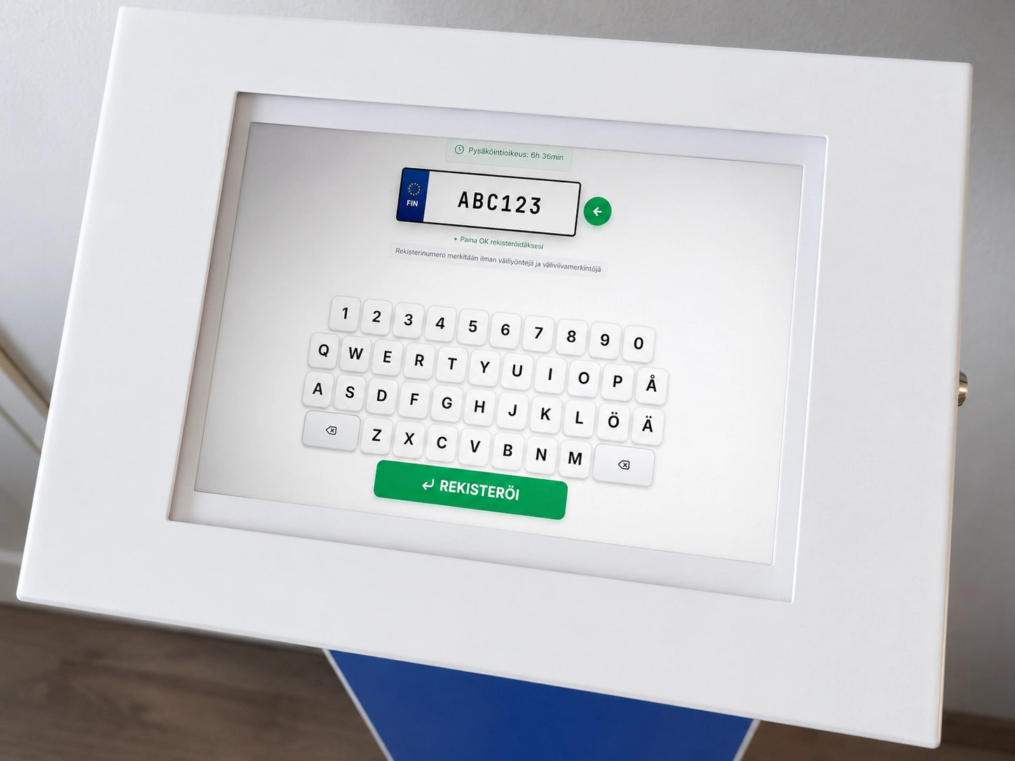 Tablettirekisteröinti vierailijapysäköintiin aulassa